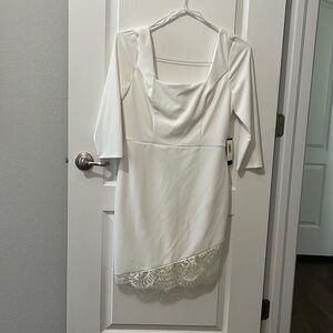 White 3/4 sleeve with lace trim. Junior 13 from Dillards. Size 6/8 in women’s.